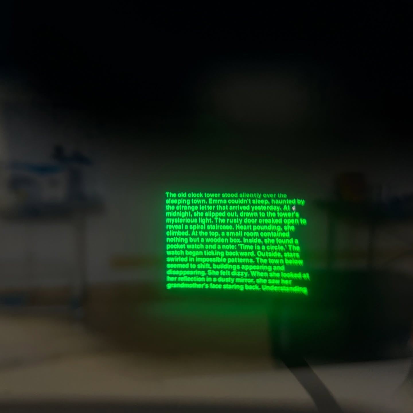 A page of green text floating in a dim room, seen through the lens